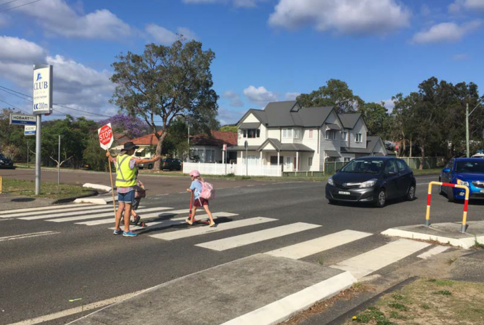 Child crossing the road at the intersection