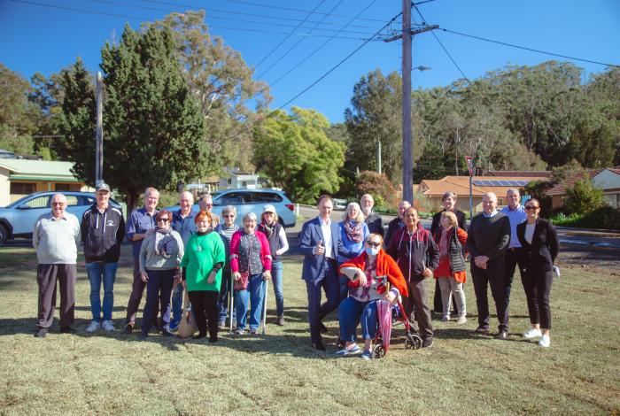 Community members standing on land at 1A Jaques Street Ourimbah